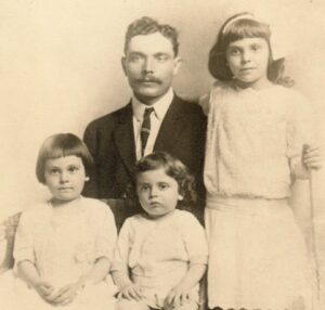 An old photo of Bessie Margolin with her father and siblings