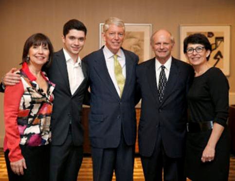 A group photo of professionals in suits image.