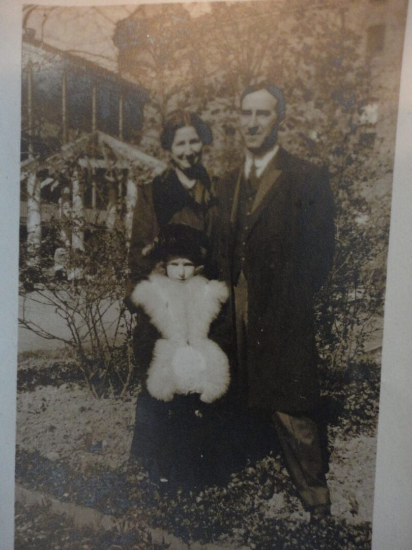 Louise Volmer with parents, Superintendent Leon Volmer and Tresa Kaufman Volmer, c. 1916