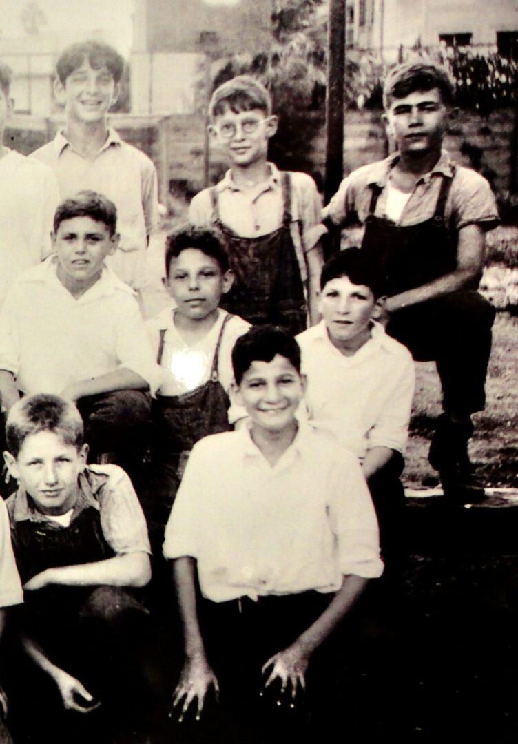 Perlis brothers (top left and center right) with other Home boys, c.1930